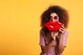 Close-up portrait of funny afro american wooman in sunglasses ho Royalty Free Stock Photo