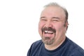 Close-up portrait of a funny mature man laughing