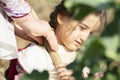 Close-up portrait of a girl at cabbage garden-training younger people at cabbage farm