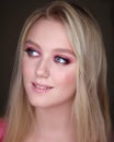 Close-up portrait of a girl with pink makeup