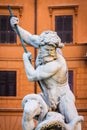 Close up portrait of God Neptune statue. Fountain of Neptune at the northern end of Navona Square /Piazza Navona/ in Rome, Italy. Royalty Free Stock Photo