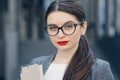 Close-up portrait of a gorgeous young woman wearing glasses. Beauty, fashion. Make-up. Optics, eyewear. Young Royalty Free Stock Photo