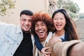 Close up portrait of a group of happy teenage friends laughing and having fun taking a selfie portrait. Young Royalty Free Stock Photo