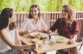 group of three best friend having conversation while lunch toget Royalty Free Stock Photo