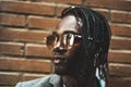 Close-up portrait of a handsome African-American man with outdoor sunglasses Royalty Free Stock Photo