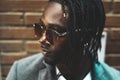 Close-up portrait of a handsome African-American man with outdoor sunglasses Royalty Free Stock Photo