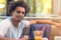 Close up portrait of handsome cheerful african man smiling looking at camera. Royalty Free Stock Photo