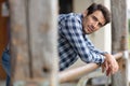 close-up portrait handsome farmer indoors in barn Royalty Free Stock Photo