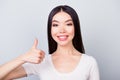 Close up portrait of happy confident smiling girl showing thumb Royalty Free Stock Photo
