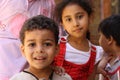 Close up portrait of happy egyptian children in chairty event