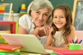 Close up portrait of happy grandmother and granddaughter Royalty Free Stock Photo