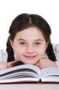 Close-up portrait happy little girl child with a book on a white Royalty Free Stock Photo