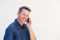 Close up happy older man talking on mobile phone Royalty Free Stock Photo