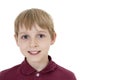 Close-up portrait of a happy pre-teen boy over white background Royalty Free Stock Photo