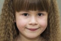 Close up portrait of happy smiling little girl with beautiful th Royalty Free Stock Photo