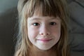 Close-up portrait of happy smiling little girl with long hair Royalty Free Stock Photo