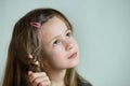 Close-up portrait of happy smiling little girl with long hair Royalty Free Stock Photo