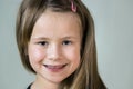 Close-up portrait of happy smiling little girl with long hair Royalty Free Stock Photo