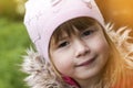 Close-up portrait of happy smiling pretty little girl. Soft light effect