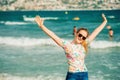 Close up portrait of happy teenage girl posing by the sea Royalty Free Stock Photo