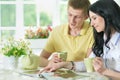 Close up portrait of happy young couple reading interesting book Royalty Free Stock Photo