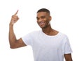 Close up portrait of a happy young man pointing finger Royalty Free Stock Photo