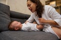 Close-up portrait of a happy young mother enjoying happy moments with her baby boy. Mom and kid face to face, together Royalty Free Stock Photo