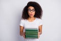 Close-up portrait of her she nice amazed overwhelmed wavy-haired girl nerd wearing thick specs holding in hands pile Royalty Free Stock Photo