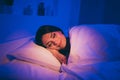 Close-up portrait of her she nice attractive charming lovely cute dreamy brunet girl lying in bed covered white duvet Royalty Free Stock Photo