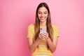 Close-up portrait of her she nice attractive lovely pretty charming cheerful cheery focused girl sending sms using Royalty Free Stock Photo