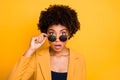 Close-up portrait of her she nice attractive pretty lovely shocked speechless wavy-haired girl touching specs staring