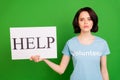 Close-up portrait of her she nice attractive sullen gloomy depressed girl wearing blue t-shirt holding in hand help