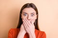 Close-up portrait of her she nice attractive terrified horrified scared straight-haired girl closing mouth palm Royalty Free Stock Photo