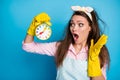 Close-up portrait of her she nice attractive worried desperate maid holding in hand clock over sleep missed wake-up call Royalty Free Stock Photo