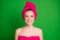 Close-up portrait of her she nice cheerful healthy lady wearing pink towel turban on head isolated over vibrant green Royalty Free Stock Photo