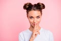 Close-up portrait of her she nice cute attractive cheerful girl lady showing shh sign isolated over pastel pink