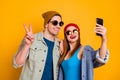 Close-up portrait of his he her she nice attractive glad cheerful cheery couple friends friendship taking selfie showing Royalty Free Stock Photo