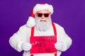 Close-up portrait of his he nice angry aggressive evil mad fury bearded Santa demonstrating placard wanted search needed Royalty Free Stock Photo