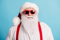 Close-up portrait of his he nice attractive cheery content white-haired father Santa wearing festal look outfit