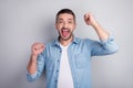 Close-up portrait of his he nice attractive successful cheerful cheery energetic motivated guy celebrating winning