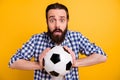 Close-up portrait of his he nice attractive worried bearded guy fan wearing checked shirt holding in hands ball isolated Royalty Free Stock Photo