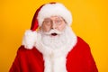 Close-up portrait of his he nice funny astonished amazed stunned wondered white-haired elderly Santa isolated over