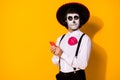 Close-up portrait of his he nice handsome cheery funny spooky guy caballero using device gadget app 5g blogg calavera Royalty Free Stock Photo