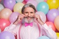 Close-up portrait of his he nice well-dressed attractive cheerful cheery imposing grey-haired mature man wearing festal