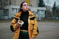 Hungry girl is eating fast street junk food Royalty Free Stock Photo