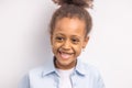 Close-up portrait of laughing mulatto child girl isolated Royalty Free Stock Photo