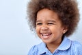 Funny little adorable African american child girl looking at side, having fun Royalty Free Stock Photo