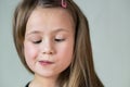 Close up portrait of little child girl with funny face expression Royalty Free Stock Photo