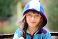 Close-up portrait of little girl in a hoody