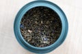 A close up portrait of loose dried fresh marrakech mint tea in a blue can. Ready to be used to make a delicious fresh cup of the Royalty Free Stock Photo